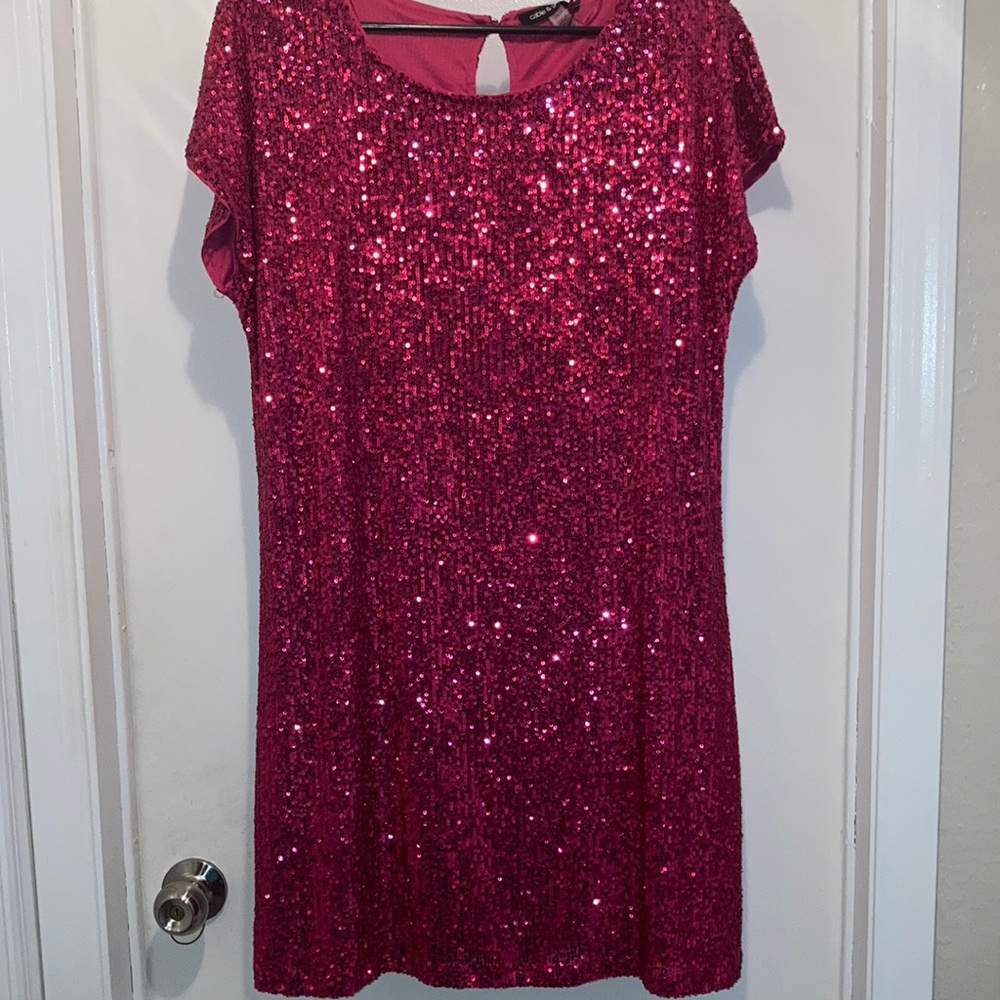 Raspberry sequin party dress. Size Large. Above knee’s and is brand new.